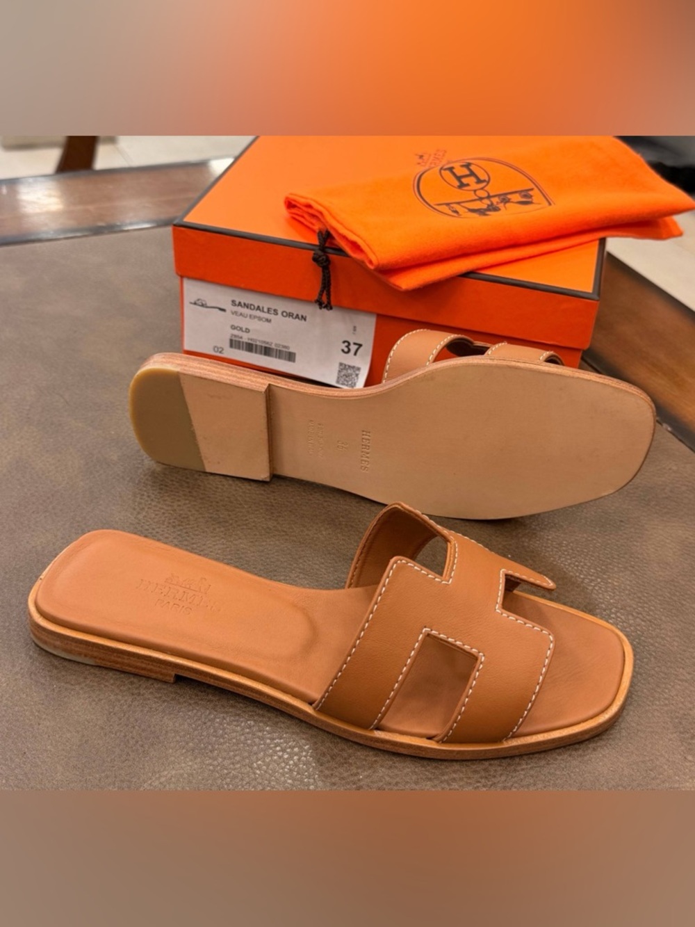 Sold out !! 
Can’t remove 
Hermès Oran Tan Leather Slide Sandals